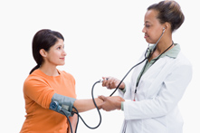 Female Healthcare Professional Taking a Woman's Blood Pressure