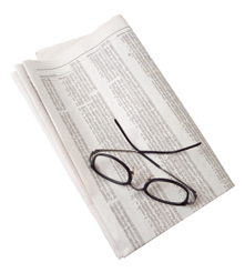 Newspaper With Reading Glasses